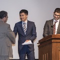 Hands shaken near podium