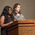 Two women at Podium